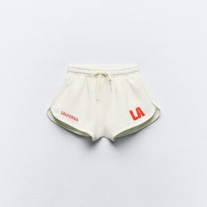 Varsity cream plush shorts Los Angeles CA embroidered red text never worn